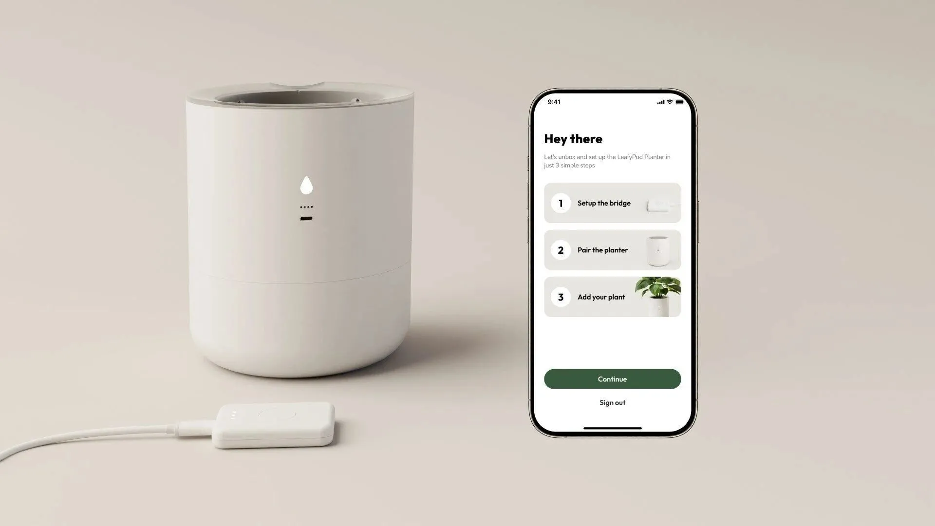 Chậu cây thông minh LeafyPod hiển thị thông báo tình trạng sức khỏe qua ứng dụng.