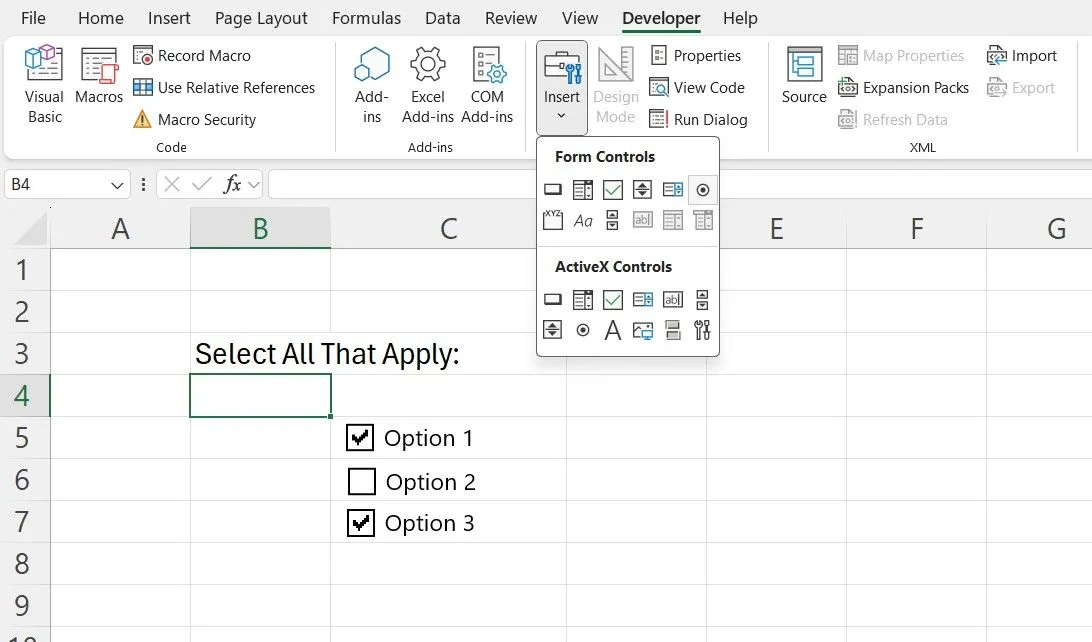 Thẻ Developer trong Microsoft Excel được kích hoạt, hiển thị các tùy chọn để chèn điều khiển biểu mẫu như hộp kiểm (checkboxes), cho phép người dùng tạo các form tương tác.